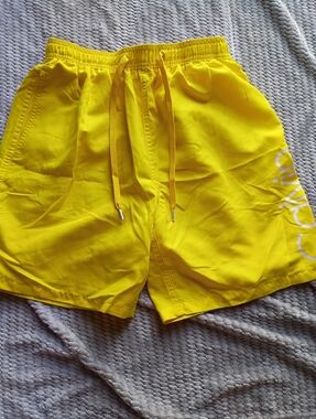 Calvin Klein Yellow Swim Trunks ATTN ling had been cut out